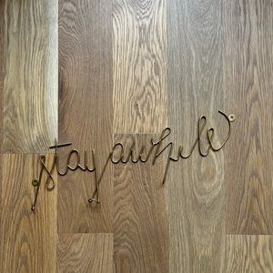 Gold “Stay awhile” key holder